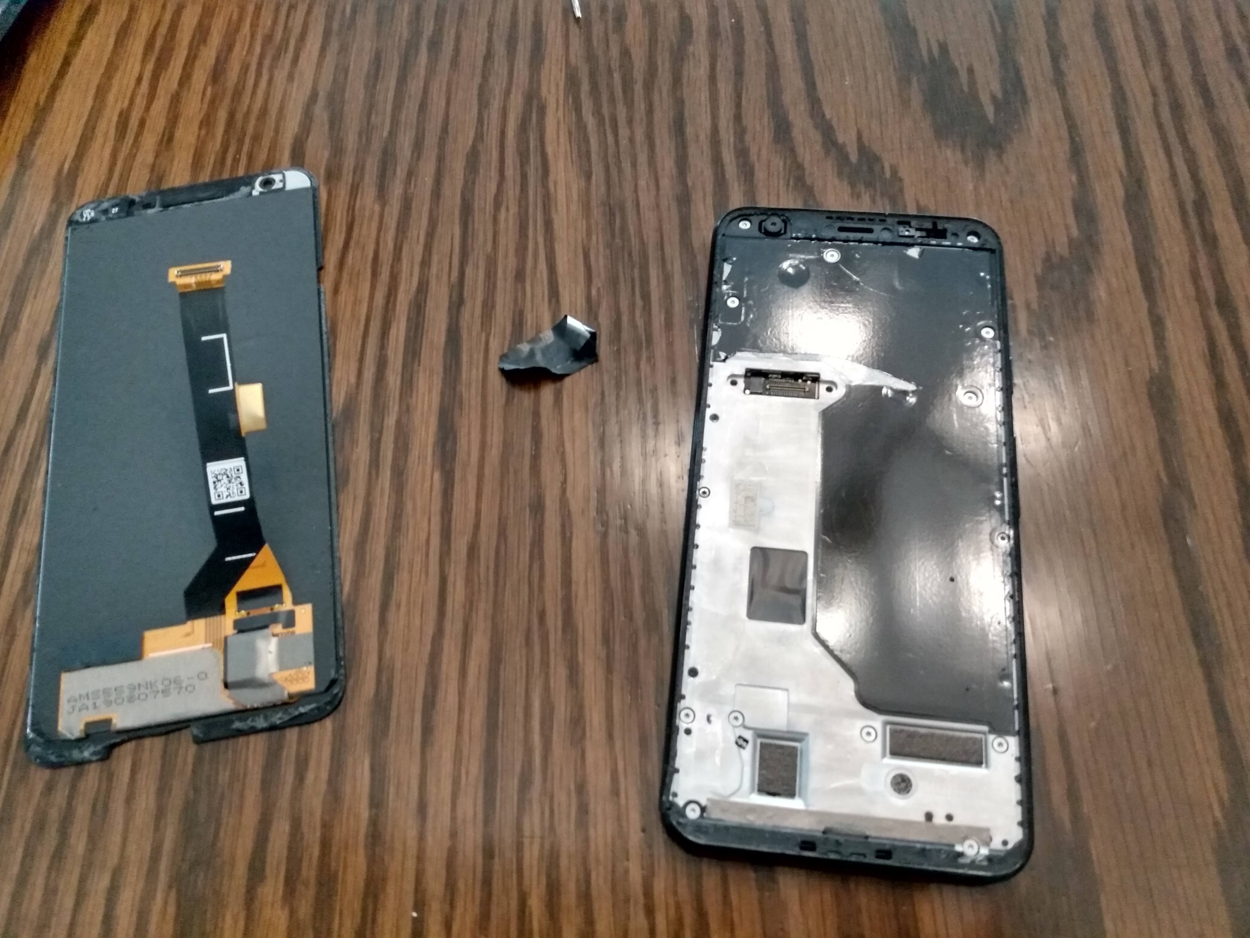 Another shot of the phone after removing the old screen